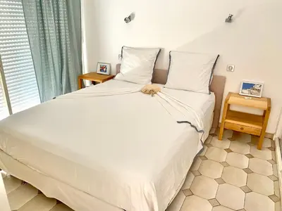 Un ou plusieurs lits dans un hébergement de l'établissement Appartement 3P 88 m2 terrasse et jardin à 20 metres de la plage