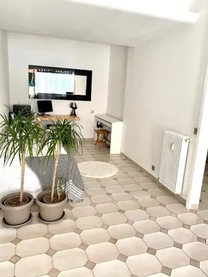 Télévision ou salle de divertissement dans l'établissement Appartement 3P 88 m2 terrasse et jardin à 20 metres de la plage