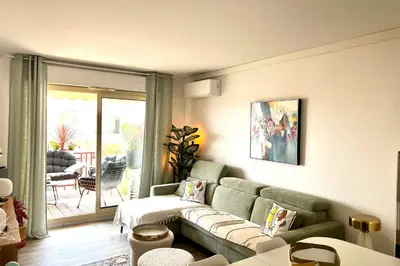 Coin salon dans l'établissement Le Meissonnier bright apartment with terrace