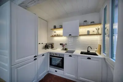 Cuisine ou kitchenette dans l'établissement IMMOGROOM - Cosy - Duplex Rénové - Proche des plages