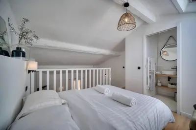 Un ou plusieurs lits dans un hébergement de l'établissement IMMOGROOM - Cosy - Duplex Rénové - Proche des plages