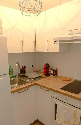 Cuisine ou kitchenette dans l'établissement Grand studio 4 couchages proche mer