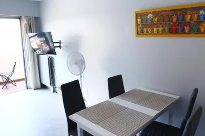 Télévision ou salle de divertissement dans l'établissement Grand studio 4 couchages proche mer