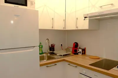 Cuisine ou kitchenette dans l'établissement Grand studio 4 couchages proche mer