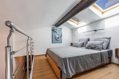 Un ou plusieurs lits dans un hébergement de l'établissement Superbe appartement en plein centre du vieil Antibes