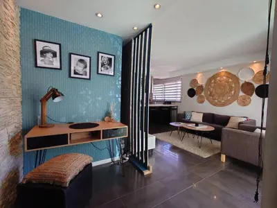 Coin salon dans l'établissement SUNRISE & SUNSET PALM BEACH CROISETTE