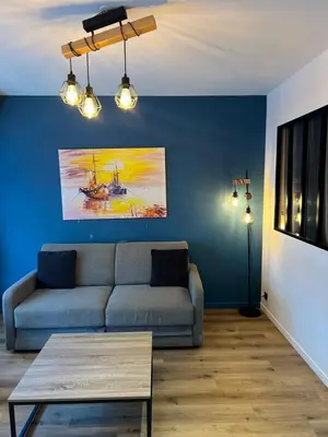 Coin salon dans l'établissement Charmant Appartement Antibes