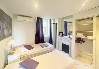 Un ou plusieurs lits dans un hébergement de l'établissement Viva Riviera Central 1 Bedroom Place Gambetta