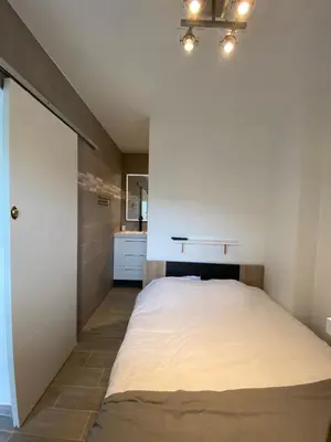 Un ou plusieurs lits dans un hébergement de l'établissement Superbe appartement rénové à neuf à 100m de la mer