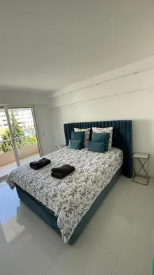 Un ou plusieurs lits dans un hébergement de l'établissement Cannes Pointe Croisette : superbe logement vue mer