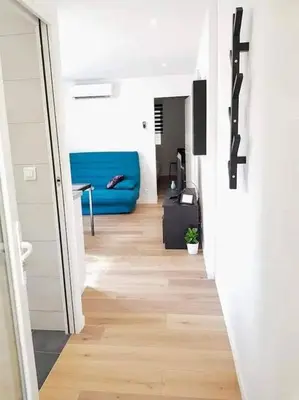 Coin salon dans l'établissement Appartement climatisé Golfe-Juan plage