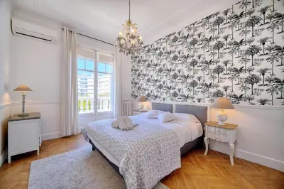 Un ou plusieurs lits dans un hébergement de l'établissement Cannes Luxury Rental - Belle epoque villa à louer proche centre Cannes