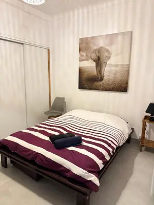 Un ou plusieurs lits dans un hébergement de l'établissement Appartement WHITE DESIGN Proche Cannes