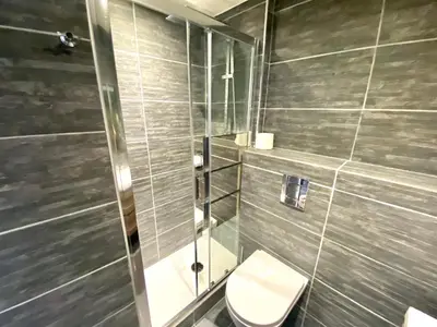 Salle de bains dans l'établissement Le Marignan SCLS - Wifi, Climatisation