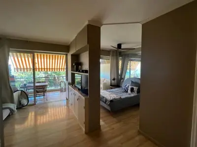 Un ou plusieurs lits dans un hébergement de l'établissement Splendid sea view 1 Bedroom access to the beach and swimming pool