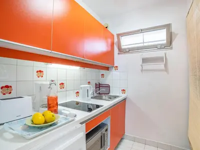 Cuisine ou kitchenette dans l'établissement Studio LE BAHIA by Interhome