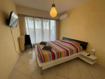 Un ou plusieurs lits dans un hébergement de l'établissement Appartement vue mer très proche de la plage et des commerces