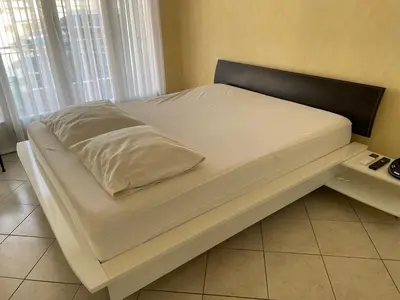 Un ou plusieurs lits dans un hébergement de l'établissement Appartement vue mer très proche de la plage et des commerces