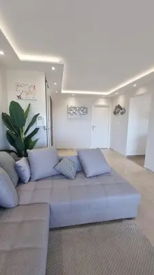 Coin salon dans l'établissement LUXURY APPARTEMENT Vue MER PANORAMIQUE