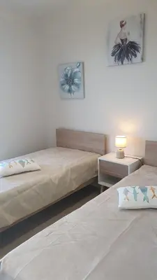 Un ou plusieurs lits dans un hébergement de l'établissement LUXURY APPARTEMENT Vue MER PANORAMIQUE