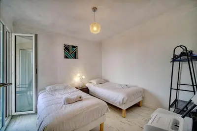 Un ou plusieurs lits dans un hébergement de l'établissement IMMOGROOM - Fully equipped - Terrace with sea view - AC