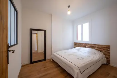 Un ou plusieurs lits dans un hébergement de l'établissement Tredici- Appartment