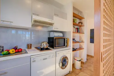 Cuisine ou kitchenette dans l'établissement Cap et Soleil - Happy Rentals