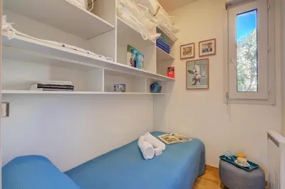 Un ou plusieurs lits dans un hébergement de l'établissement Cap et Soleil - Happy Rentals