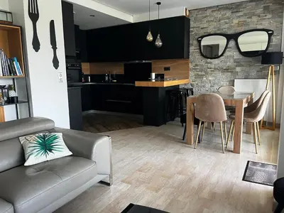 Cuisine ou kitchenette dans l'établissement 4P, Piscine, Tennis, Wifi, Proche Centre et Plages
