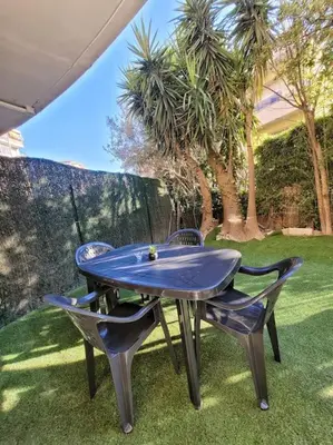 Jardin de l'établissement Parking privé + Jardin + Clim proche Plage & Resto