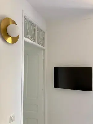 Télévision ou salle de divertissement dans l'établissement Cannes - L'Oustaou