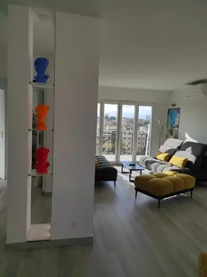 Coin salon dans l'établissement Rooftop condo RAMSES
