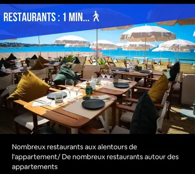 Restaurant ou autre lieu de restauration dans l'établissement Impeccable 3 pièces avec balcons, la plage à 50m Juan les pins proche Cannes