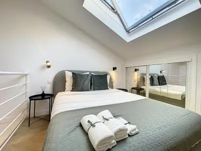Un ou plusieurs lits dans un hébergement de l'établissement Cannes : Duplex à 5 minutes à pied du Palais des Festivals