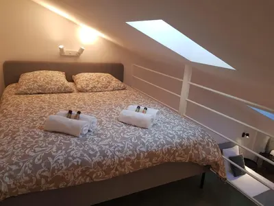 Un ou plusieurs lits dans un hébergement de l'établissement Cannes : Duplex à 5 minutes à pied du Palais des Festivals