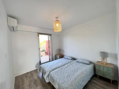 Un ou plusieurs lits dans un hébergement de l'établissement Rooftop Villeneuve