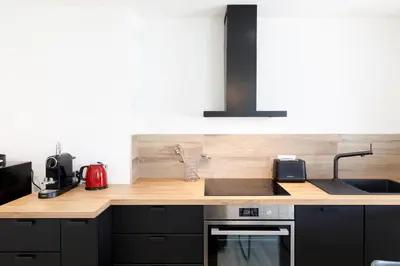 Cuisine ou kitchenette dans l'établissement Palladium 148 YourHostHelper