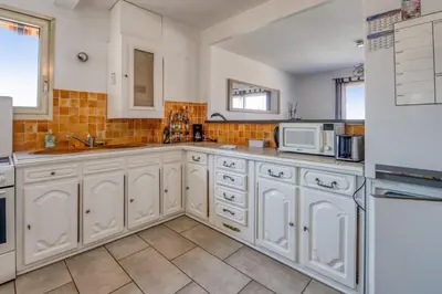Cuisine ou kitchenette dans l'établissement Appartement Berthelotine - Welkeys