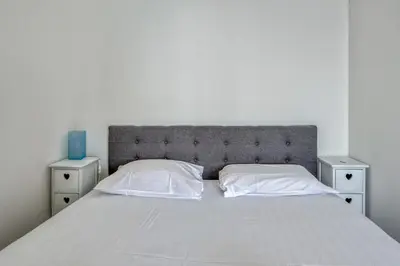 Un ou plusieurs lits dans un hébergement de l'établissement Appartement Rivage - Welkeys