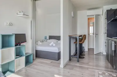 Un ou plusieurs lits dans un hébergement de l'établissement Appartement Rivage - Welkeys