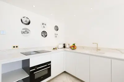 Cuisine ou kitchenette dans l'établissement Les Légendes YourHostHelper