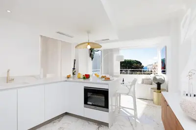 Cuisine ou kitchenette dans l'établissement Les Légendes YourHostHelper