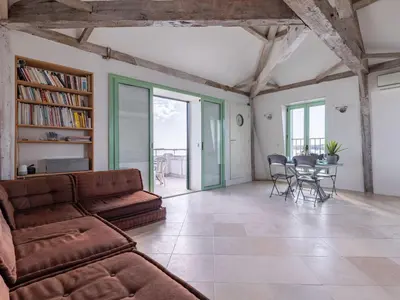 Coin salon dans l'établissement Apartment Les Araucarias by Interhome