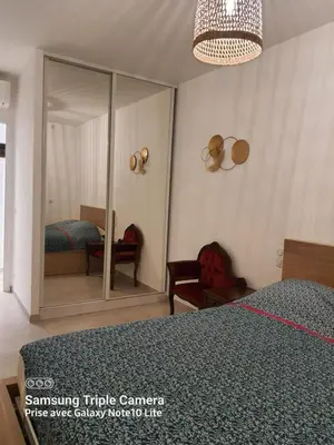 Un ou plusieurs lits dans un hébergement de l'établissement Les Violettes 3 pièces centre ville Antibes
