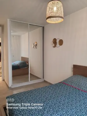 Un ou plusieurs lits dans un hébergement de l'établissement Les Violettes 3 pièces centre ville Antibes