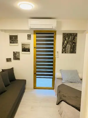 Un ou plusieurs lits dans un hébergement de l'établissement 3 pièces terrasse, jardin