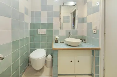 Salle de bains dans l'établissement Palais Miramar - Suite Blue Room - Vue Mer -Croisette Emplacement Unique - 20M Plage - WIFI - Clim