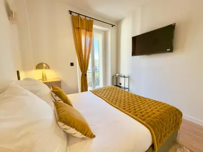Un ou plusieurs lits dans un hébergement de l'établissement Superbe 3 pièces - 2 chambres avec Terrasse, 4 mn Palais