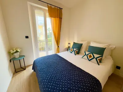 Un ou plusieurs lits dans un hébergement de l'établissement Superbe 3 pièces - 2 chambres avec Terrasse, 4 mn Palais