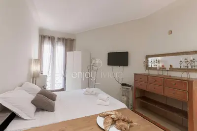 Un ou plusieurs lits dans un hébergement de l'établissement Palais Miramar - Suite & E37 - 20M Plage - Croisette Emplacement Unique - WIFI - Clim